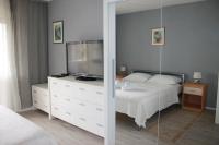 Posteľ alebo postele v izbe v ubytovaní Apartment Brazuca-Center