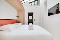 Katil atau katil-katil dalam bilik di Urban Elegance for 7 - Close Montmartre