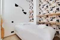 Katil atau katil-katil dalam bilik di Urban Elegance for 7 - Close Montmartre