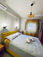 Postel nebo postele na pokoji v ubytování Lucky House