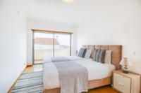 Postel nebo postele na pokoji v ubytování Admiral House Estoril