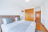 Postel nebo postele na pokoji v ubytování Admiral House Estoril