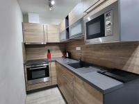 Kuchyň nebo kuchyňský kout v ubytování Apartmán Refrino na jedinečném místě
