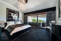 Postel nebo postele na pokoji v ubytování Villa Plage Grande - Superstar luxury - Beachtop