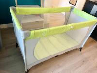 a baby crib with a yellow and white top at Moderne T2 - Nancy gare (200m) - Wifi - Netflix in Nancy