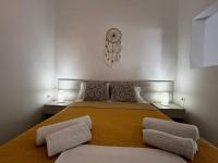 Posteľ alebo postele v izbe v ubytovaní Myrtos Cosy Apartments