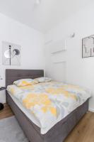 Postel nebo postele na pokoji v ubytování Apartment Modern Studio Near Žnjan Beach