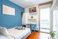 A bed or beds in a room at Camplus Lambrate Casa per Ferie