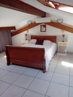 Una cama o camas en una habitaci&oacute;n de Villa Calvi avec grand jardin.