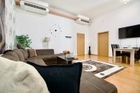 Televízia a/alebo spoločenská miestnosť v ubytovaní Premium Apartment by Hi5 - Vitkovics Suite