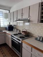 Tranquilo DEPARTAMENTO SAN DIEGOにあるキッチンまたは簡易キッチン