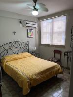 Tranquilo DEPARTAMENTO SAN DIEGOにあるベッド
