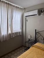 Tranquilo DEPARTAMENTO SAN DIEGOにあるベッド