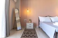 Posteľ alebo postele v izbe v ubytovaní Levanda Luxury Studios Apartments