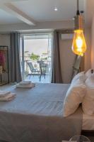 Posteľ alebo postele v izbe v ubytovaní Levanda Luxury Studios Apartments