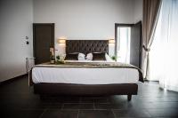 Posteľ alebo postele v izbe v ubytovaní San Pietro Leisure and Luxury