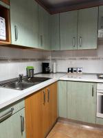 Kuchyň nebo kuchyňský kout v ubytování APARTAMENT SARDINA NEAR THE BEACH WITH POOL AND WIFI e
