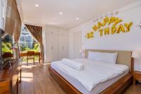 Ein Bett oder Betten in einem Zimmer der Unterkunft Biệt Thự Lan Anh Đà Lạt