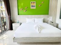 Postel nebo postele na pokoji v ubytování Anantra Pattaya Resort