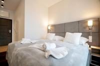 Posteľ alebo postele v izbe v ubytovaní BelMare by Baltic Home