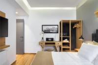 Televízia a/alebo spoločenská miestnosť v ubytovaní Acropolis Unique Residence