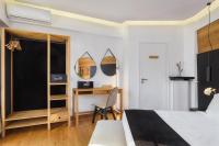 Posteľ alebo postele v izbe v ubytovaní Acropolis Unique Residence