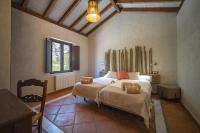 Posteľ alebo postele v izbe v ubytovaní Eco Hotel Cueva del Gato