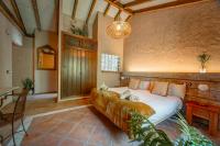 Posteľ alebo postele v izbe v ubytovaní Eco Hotel Cueva del Gato