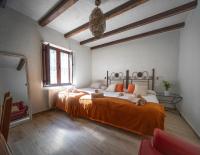 Posteľ alebo postele v izbe v ubytovaní Eco Hotel Cueva del Gato