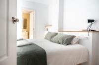 Posteľ alebo postele v izbe v ubytovaní CALMA Apartments
