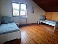 Postel nebo postele na pokoji v ubytování L8 Ferienwohnung - Stuttgart Renningen