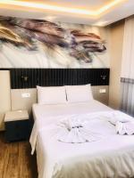 Postel nebo postele na pokoji v ubytování Bonita Hotel
