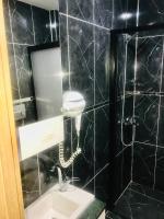 Koupelna v ubytování Bonita Hotel