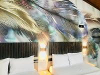 Postel nebo postele na pokoji v ubytování Bonita Hotel
