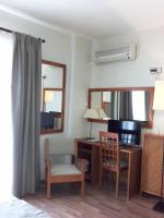 Posteľ alebo postele v izbe v ubytovaní Hotel Sierra Las Villas