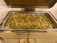 a casserole in a pan in an oven at شقق قصر ارين in Jeddah