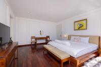 Ein Bett oder Betten in einem Zimmer der Unterkunft Biệt Thự Lan Anh Đà Lạt