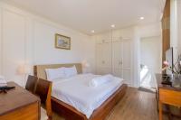 Ein Bett oder Betten in einem Zimmer der Unterkunft Biệt Thự Lan Anh Đà Lạt