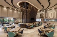 an image of a restaurant with tables and chairs at Imperial Lexis Kuala Lumpur in Kuala Lumpur