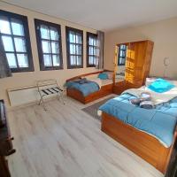 Postel nebo postele na pokoji v ubytování Aura house