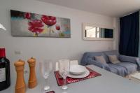 Posezení v ubytování Borinquen 1 - Studio with amazing sea and pool views