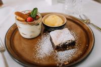 a plate of desserts on a table at Hotel Auszeit St Lambrecht in Sankt Lambrecht
