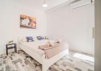 Postel nebo postele na pokoji v ubytování Aroma D’Valencia Apartment