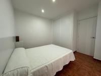 Postel nebo postele na pokoji v ubytování Apartamentos Alma de Zahara