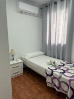 Postel nebo postele na pokoji v ubytování Apartamentos Alma de Zahara
