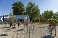 a group of children playing in a playground at Bungalow pour 5 - TV - Clim - Terrasse ensoleillée in Boofzheim