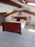 Una cama o camas en una habitaci&oacute;n de Villa Calvi avec grand jardin.