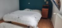 Posteľ alebo postele v izbe v ubytovaní Maison Spacieuse avec du Charme - Tout proche de la mer