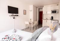 Kuchnia lub aneks kuchenny w obiekcie Cosy Appartement - 4 personnes - Disneyland & Paris