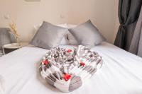 Łóżko lub łóżka w pokoju w obiekcie Cosy Appartement - 4 personnes - Disneyland & Paris